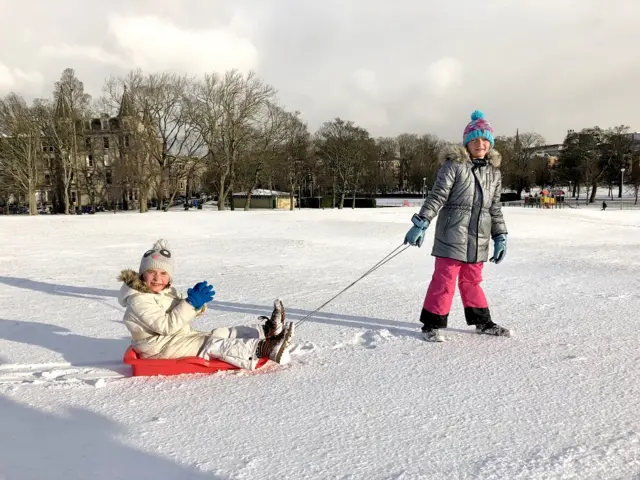 Two children with sledge