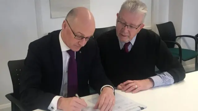 Deputy First Minister John Swinney signed the continuity bill alongside Mr Russell