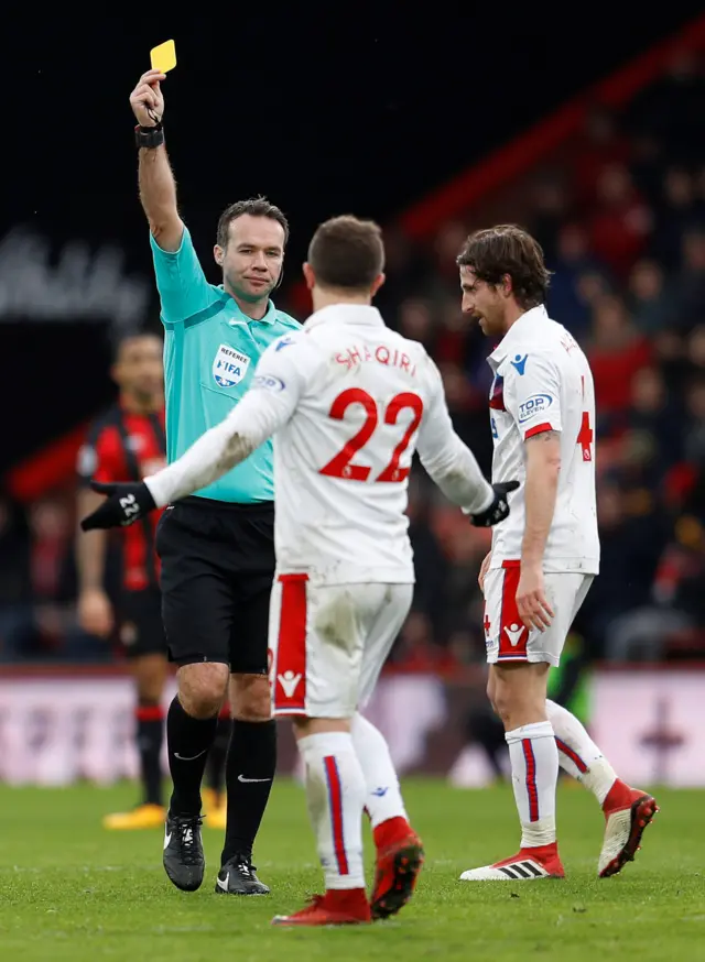 Xherdan Shaqiri of Stoke is booked in the first-half