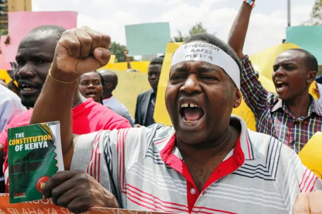 Civil society activists shout slogans during a protest against the closure of three private TV stations by government in downtown Nairobi, Kenya, 05 February 2018.