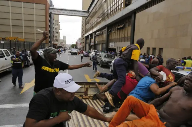 ANC supporters attack suspected BLF members on the back of a pick up lorry in Jahannesburg