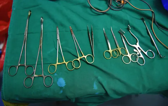 This photo taken on May 11, 2017 in Nairobi shows surgical instruments used in the process of clitoral restorative surger