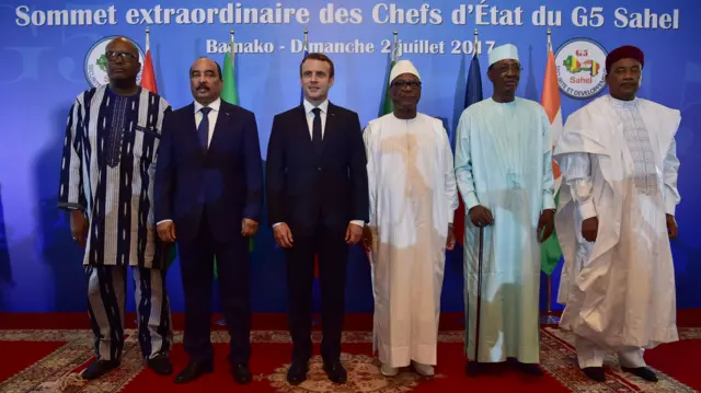 (From L) President of Burkina Faso Roch Marc Christian Kabore, Mauritanian President Mohamed Ould Abdel Aziz, French President Emmanuel Macron, Mali's President Ibrahim Boubacar Keita, Chad's president Idriss Deby Itno and Niger's President Mahamadou Issoufou poses during the G5 Sahel summit, in Bamako, on July 2, 2017.