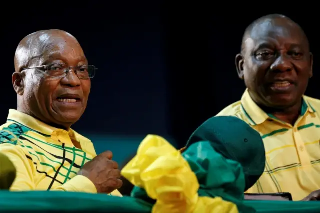 South African President Jacob Zuma sits next to his deputy Cyril Ramaphosa at the 54th National Conference of the ruling African National Congress (ANC) at the Nasrec Expo Centre in Johannesburg, South Africa December 16, 2017.