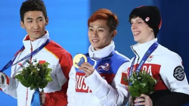 Speed skater Viktor Ahn (middle) won three gold medals at Sochi 2014