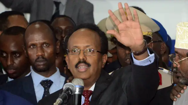 Newly elected President of Somalia and former prime minister Mohamed Abdullahi Farmajo gestures as he makes an address on February 8, 2017, in Mogadishu after he was elected president.