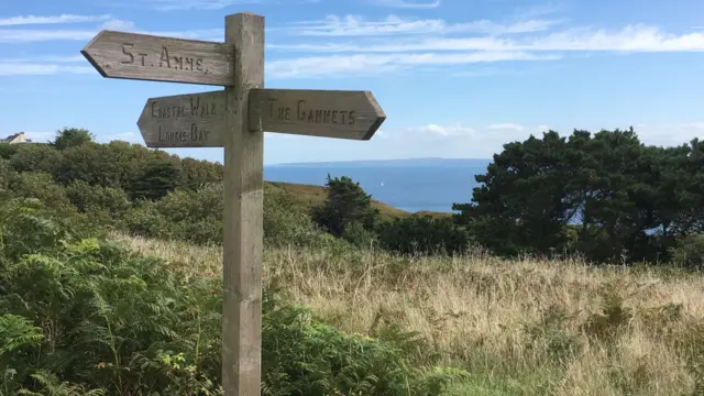 Alderney tourist sign