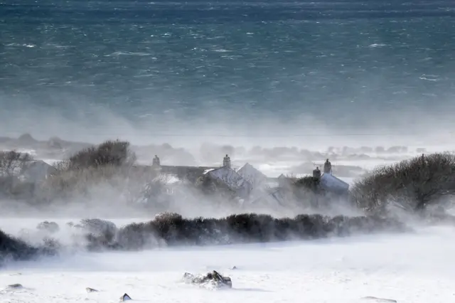 A house in Cornwall is covered in snow