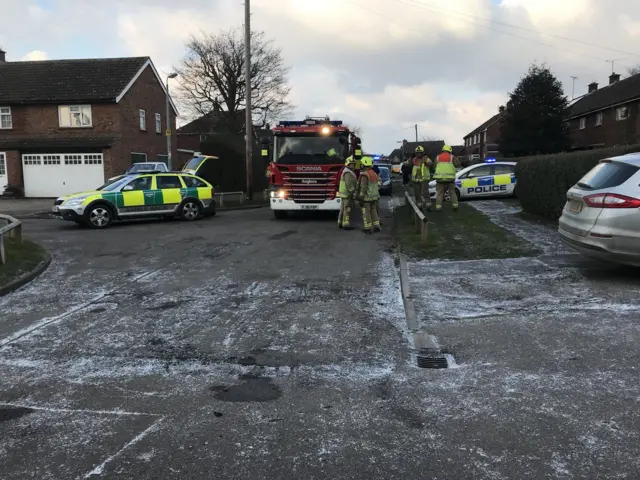 Emergency services outside a house