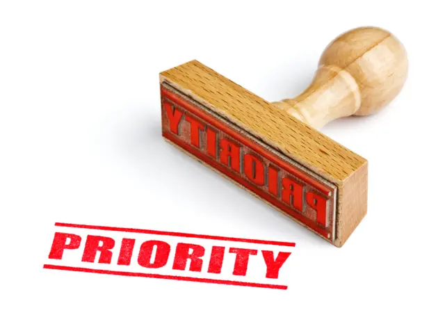 A stamp marked: Priority