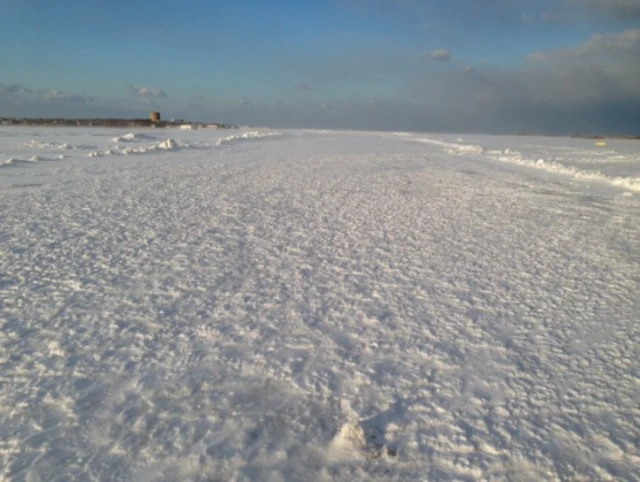 Alderney Airport's runway covered in snow