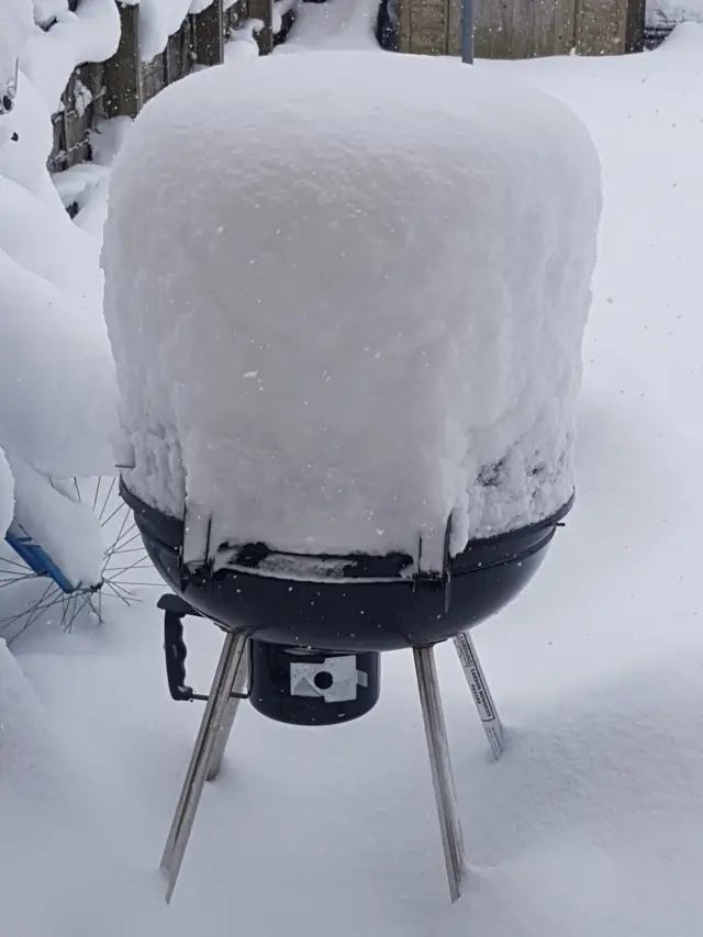 snow-covered barbecue