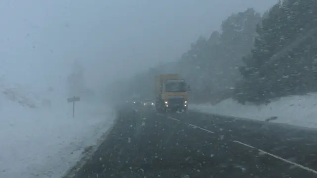 Traffic on road in snow