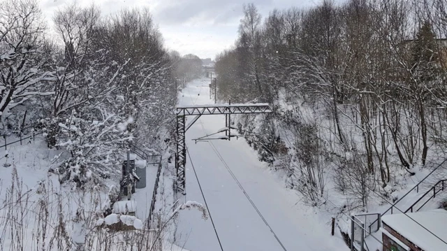 A snow-covered railway line in Scotland