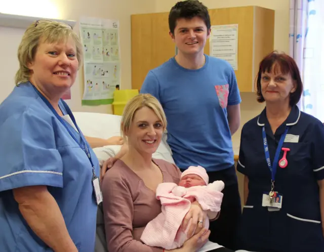 Daniella, Siena, husband Andrew and hospital staff