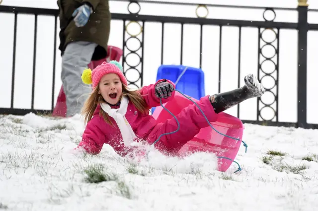 Lily, 7, sledging in Roath Park, Cardiff