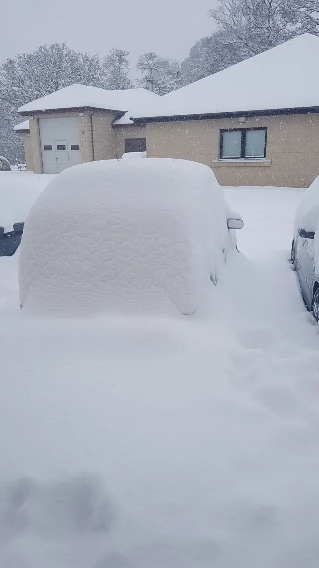 snowbound car