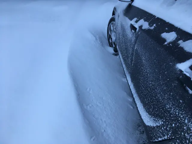 Car stuck in snow