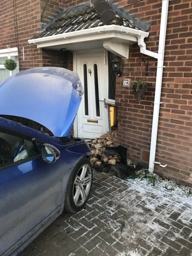 Car that went into a house