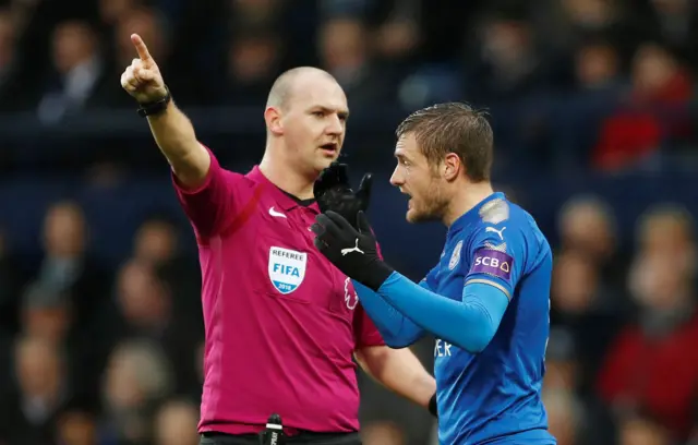 Jamie Vardy remonstrates with referee Robert Madley