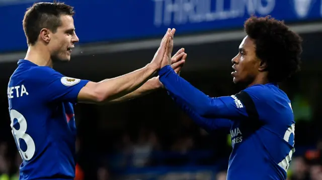 Azplilicueta and Willian celebrate