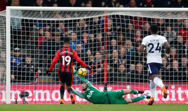 Junior Stanislas shoots and sees his shot come off the crossbar