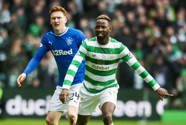 Rangers' David Bates and Celtic's Moussa Dembele