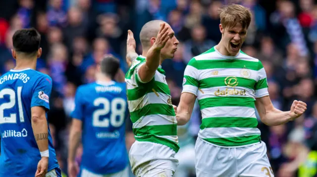 Celtic's Scott Brown and Kristoffer Ajer celebrate