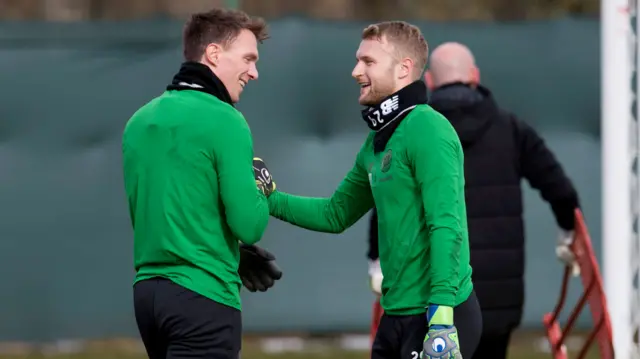 Celtic's Dorus De Vries and Scott Bain