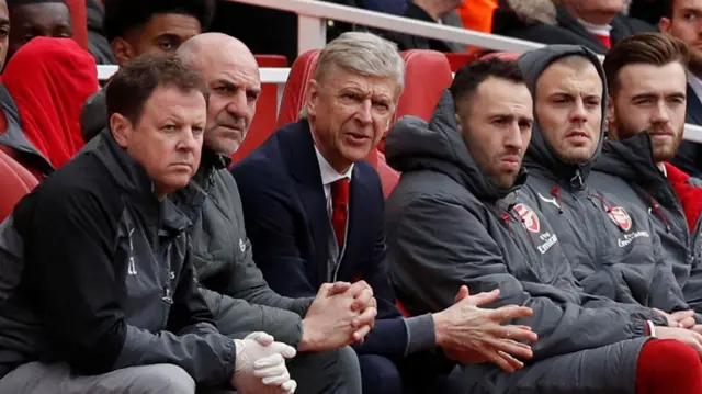 Arsene Wenger watches on from the bench