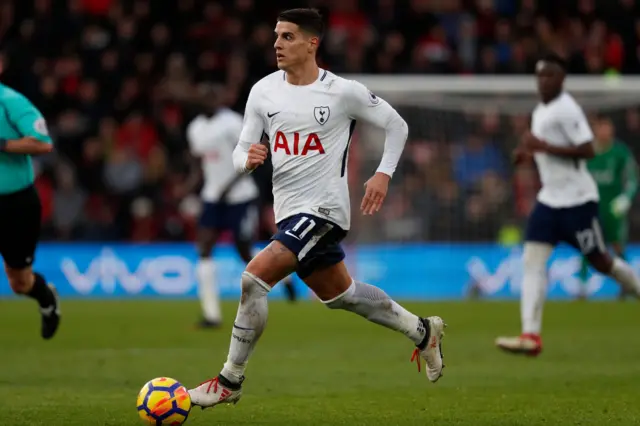 Erik Lamela runs with possession