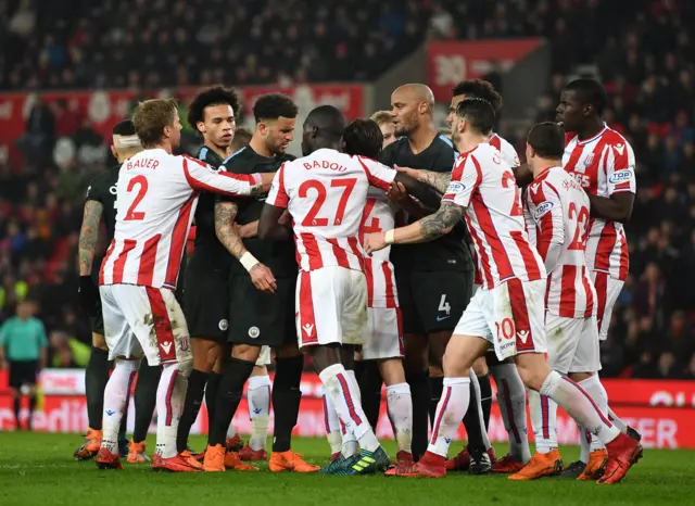 Stoke and Manchester City players argue