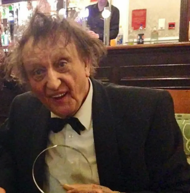 Sir Ken Dodd collecting the "Legend of Comedy" Award at the 2014 Leicester Comedy Festival