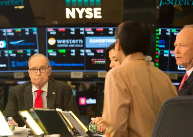 US conservative commentator and economic analyst Larry Kudlow speaks on the set of CNBC at the closing bell of the Dow Industrial Average at the New York Stock Exchange on March 8, 2018 in New York.