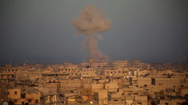 Smoke billows in Zamalka, in the Syrian rebel enclave of Eastern Ghouta