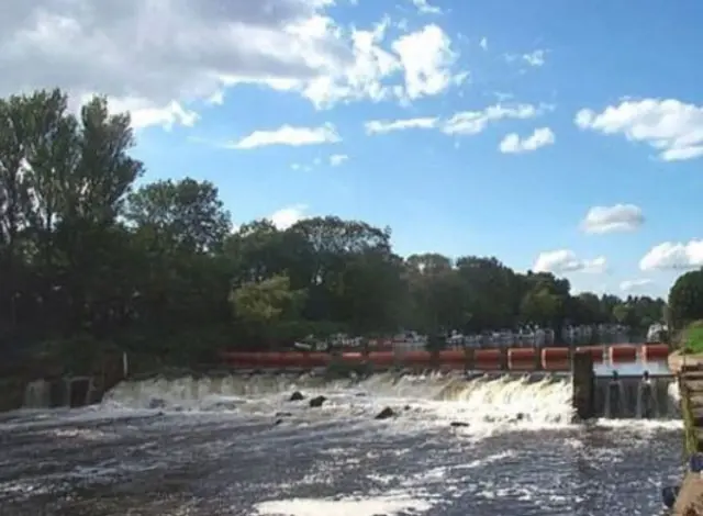 Naburn Lock where a flood warning is in place