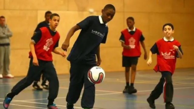 Children playing football