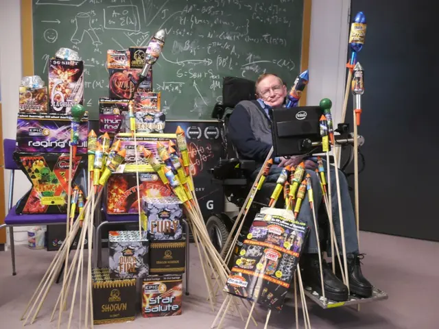 Stephen Hawking at Cambridge University with fireworks