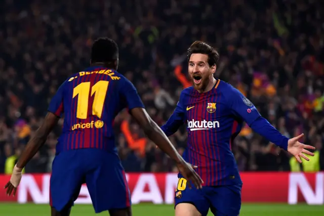 Ousmane Dembele celebrates with  Lionel Messi