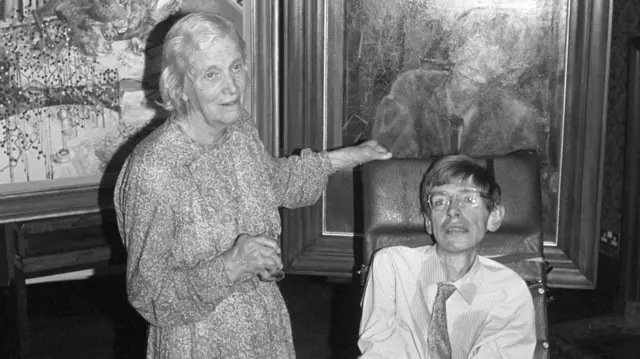 Prof Stephen Hawking and Nobel Prize winner Dorothy Hodgkin, with their portraits at the National Portrait Gallery in London