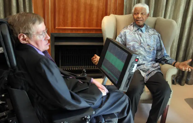 South Africa former President Nelson Mandela (R) meets with British scientist Professor Stephen Hawking (L) in Johannesburg on May 15, 2008.