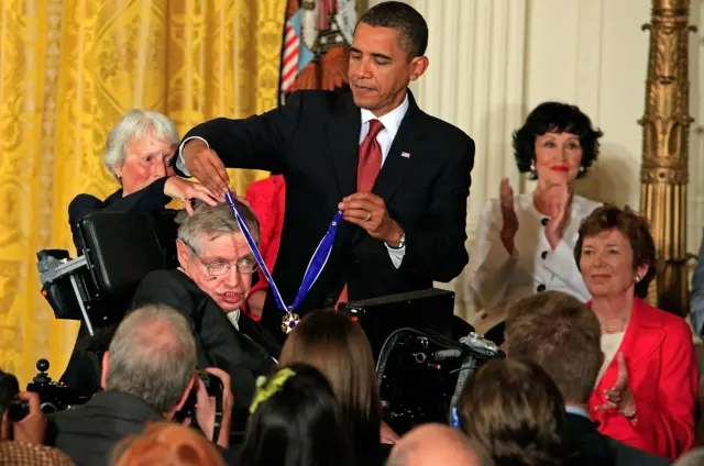 US President Barack Obama presents the Presidential Medal of Freedom to British theoretical physicist Stephen Hawking