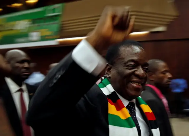 Zimbabwean President Emmerson Mnangagwa greets supporters of his ruling Zimbabwe African National Union â€“ Patriotic Front (ZANUâ€“PF) party at a rally in Harare, Zimbabwe March 7, 2018