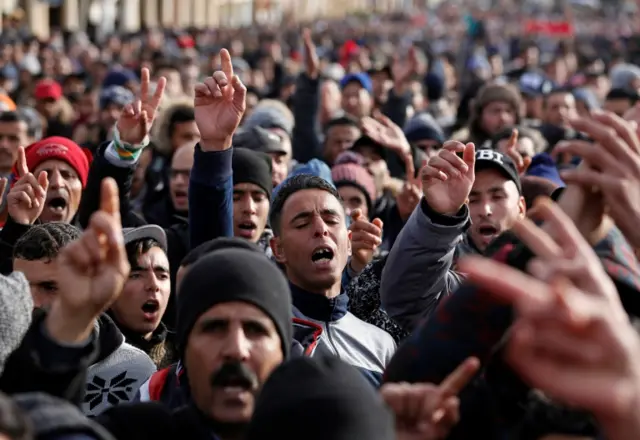 People shout slogans during a protest after the death of a miner in Jerada, Morocco, in February