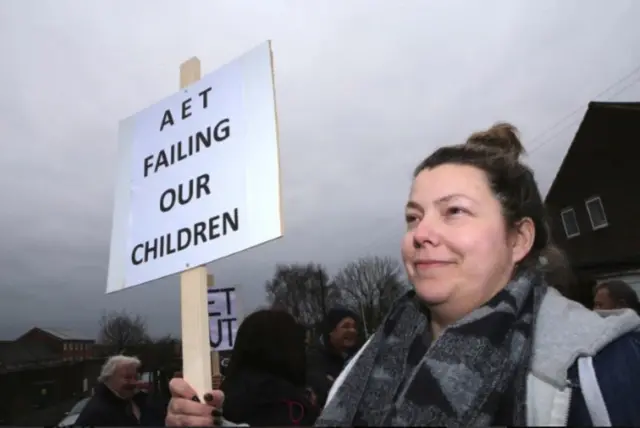 Protestor with placard