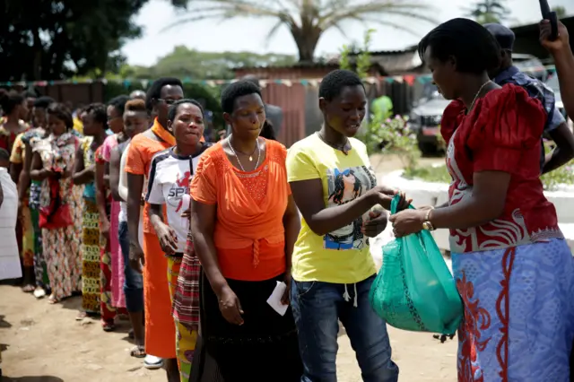 Burundian Justice Minister Aimee Laurentine Kanyana gave our food to former prisoners after their release from the Mpimba Central Prison as part of a mass presidential pardon, in Bujumbura, Burundi