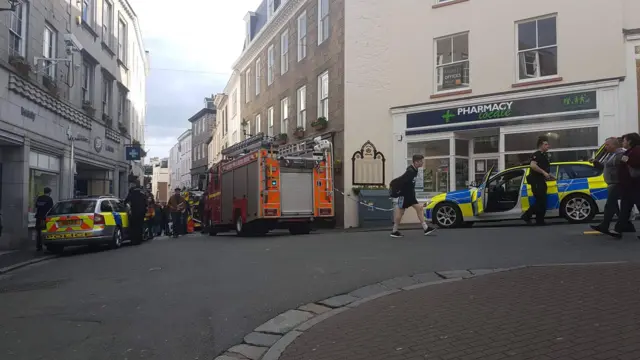 Fire and police vehicles in High Street, St Peter Port