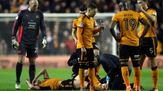 Diogo Jota lying injured on pitch