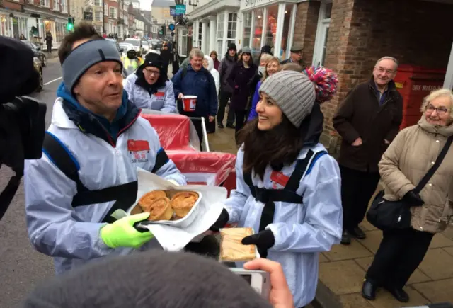 Paul and Amy receive pies