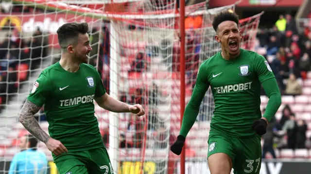 Callum Robinson celebrates his goal for Preston